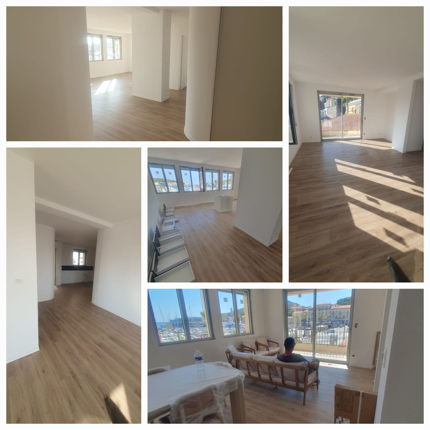 Appartement rénové avec peinture blanche et sol stratifié vue marina sur la côte catalane